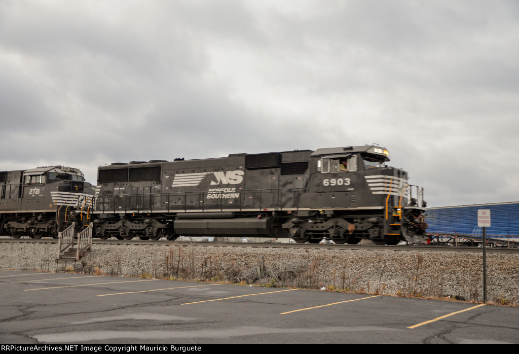 NS SD60E Locomotive leading a train